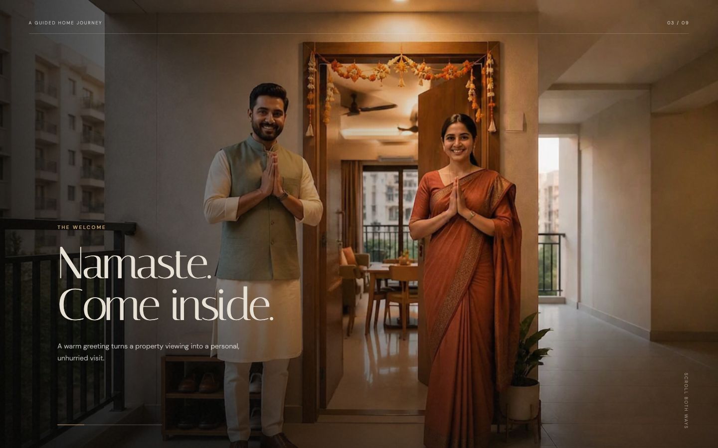 Aangan tour stop 'Namaste. Come inside.' showing a couple greeting at a decorated doorway
